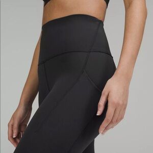 Lululemon Black Wunder Under Leggings with Pockets 25 in inseam size 10